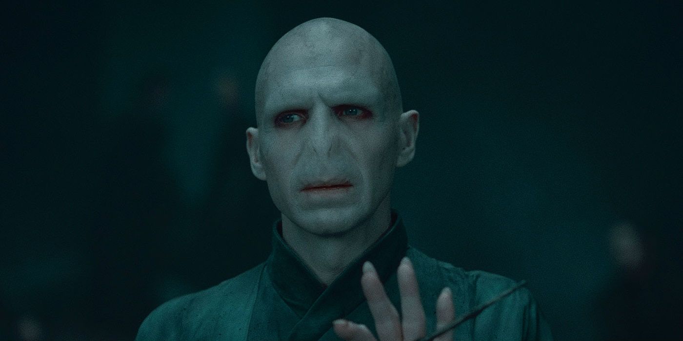Voldemort raises his hand in an image from Harry Potter