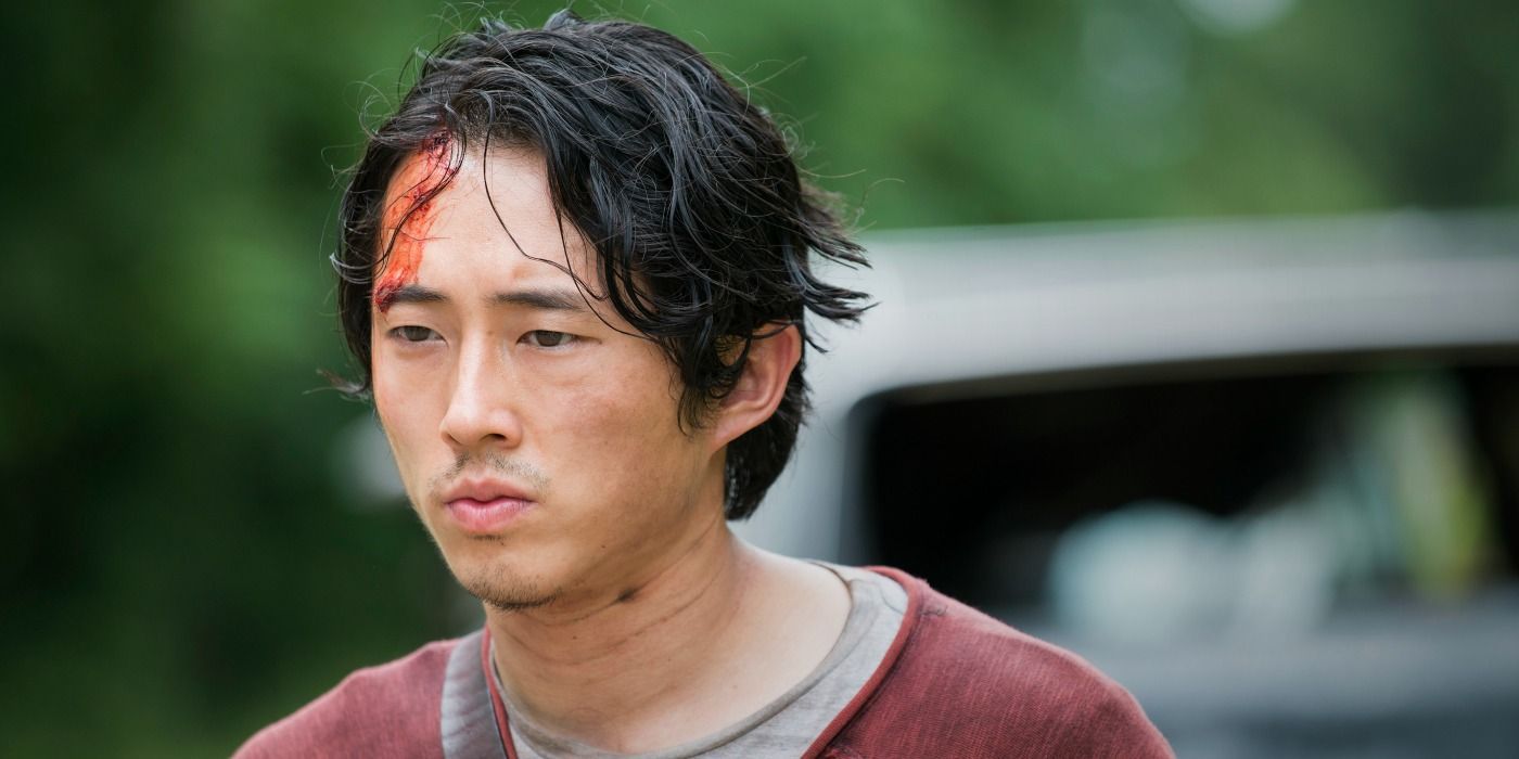 Glenn walks outside with blood on his head in The Walking Dead