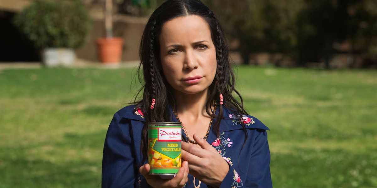 Beth holding a can of food in Wet Hot American Summer