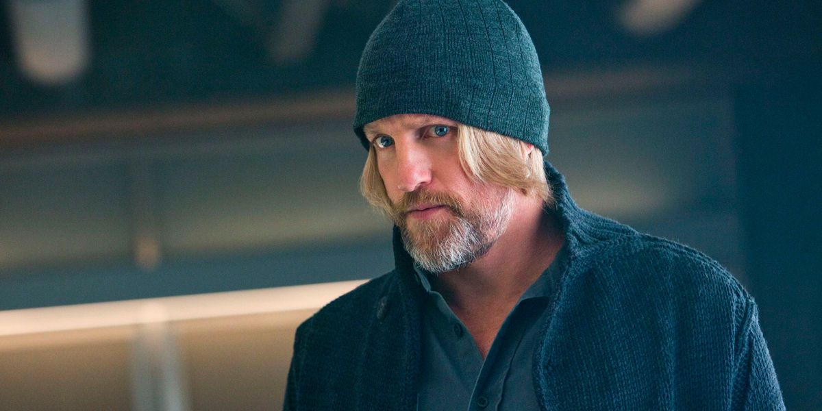 Haymitch Abernathy looking at someone with a suspicious look on his face in The Hunger Games.