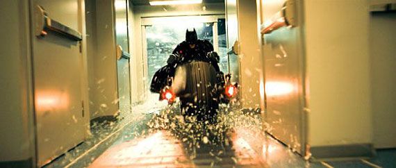 Batman rides the Batpod in The Dark Knight