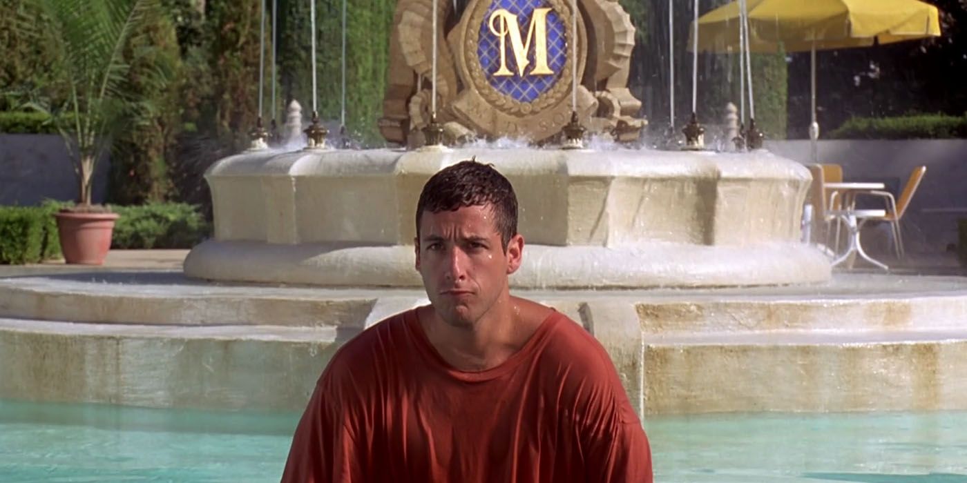 Billy Madison in front of a fountain in Billy Madison