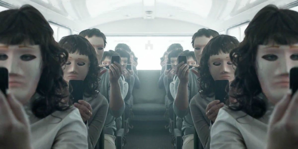 People wearing masks ride a bus from Black Mirror 