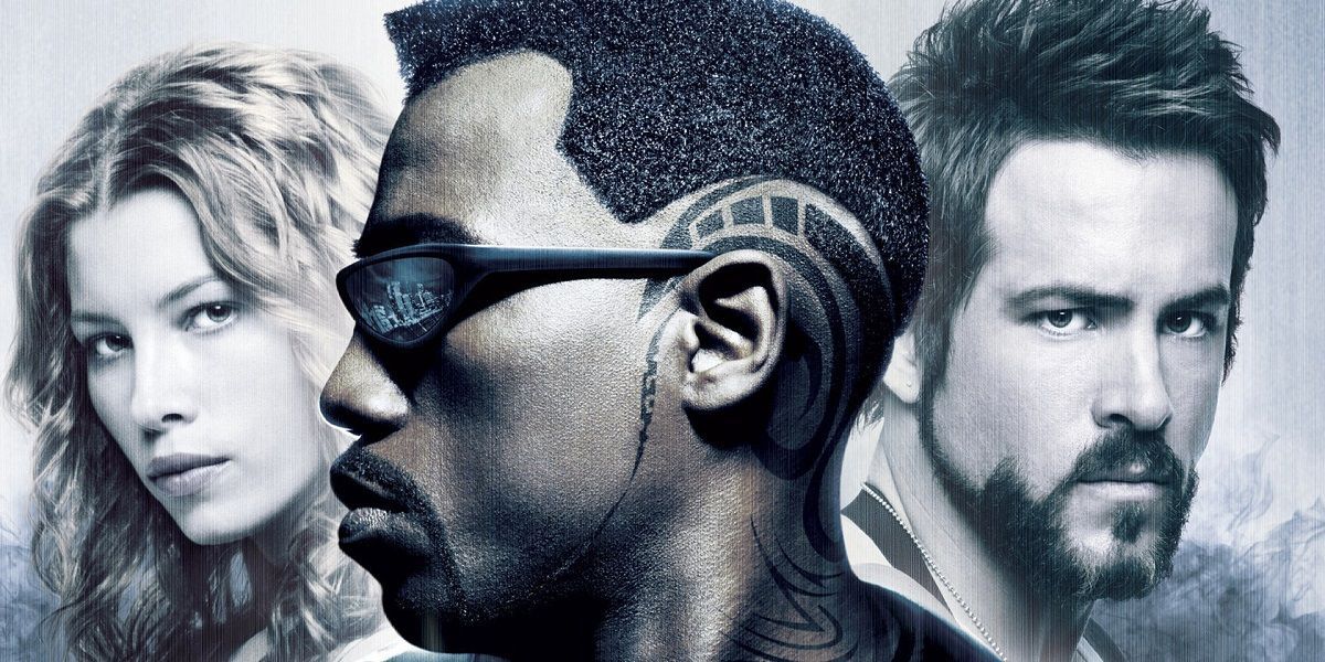 Jessica Biel, Wesley Snipes, and Ryan Reynolds on the cover of Blade: Trinity (2004)