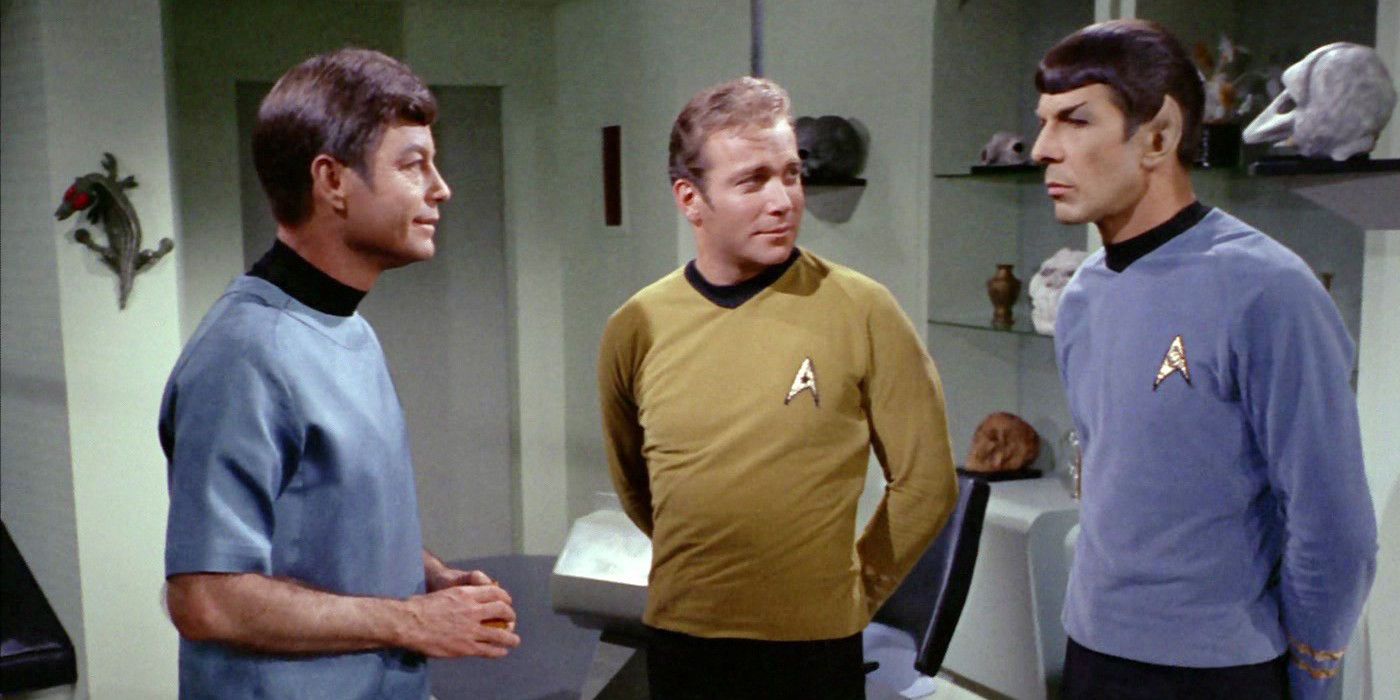 Spock, Kirk, and Bones talk in sickbay