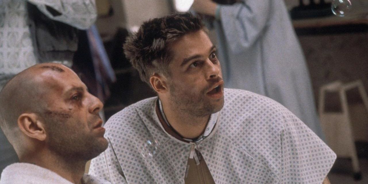 Brad Pitt and Bruce Willis in 12 Monkeys - 10 Crazy Movies About Mental Asylums