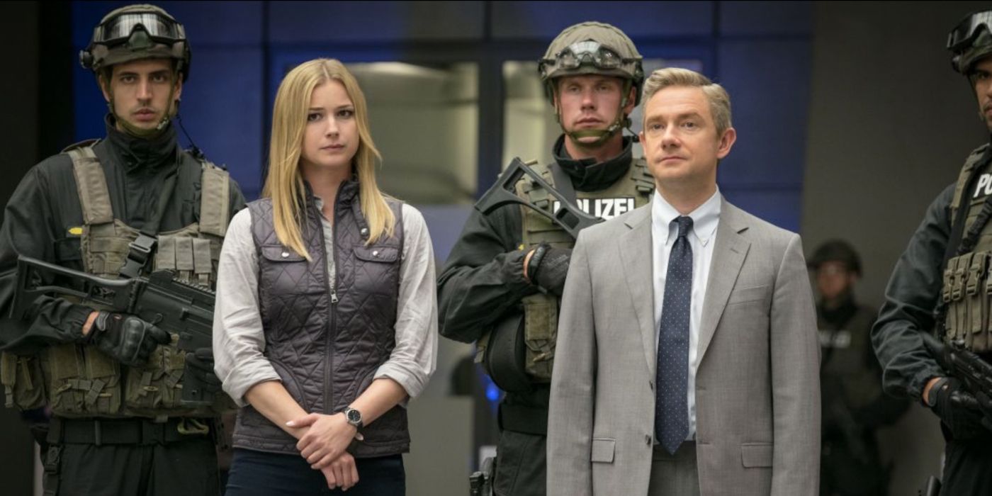 Sharon Carter gets escorted by army officers after helping Steve Rogers