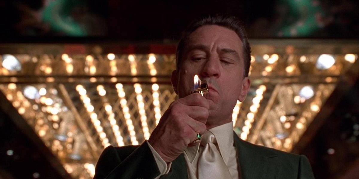 Robert De Niro lighting a cigarette in Casino