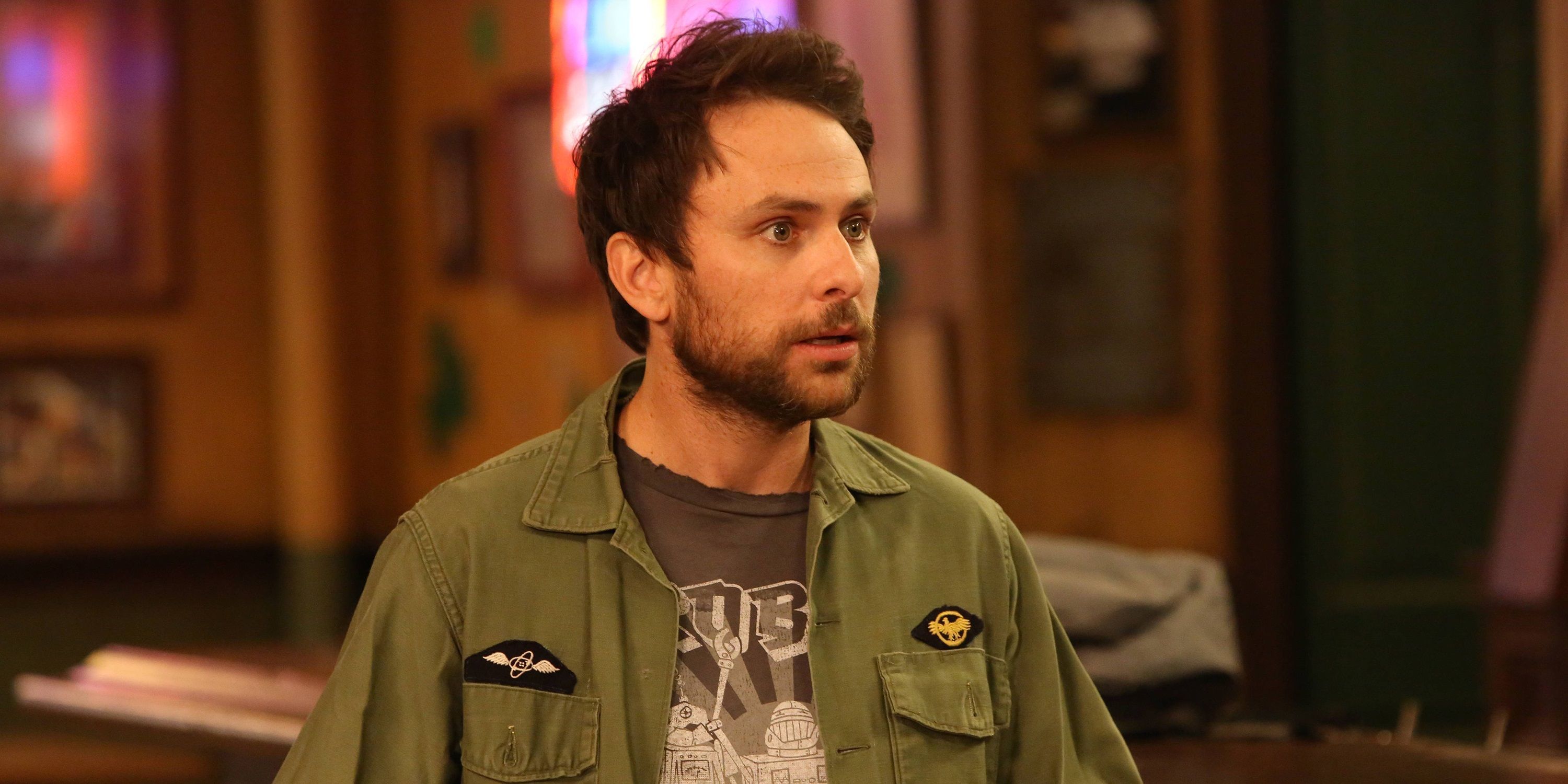 Charlie wearing his green polo in It's Always Sunny in Philadelphia.
