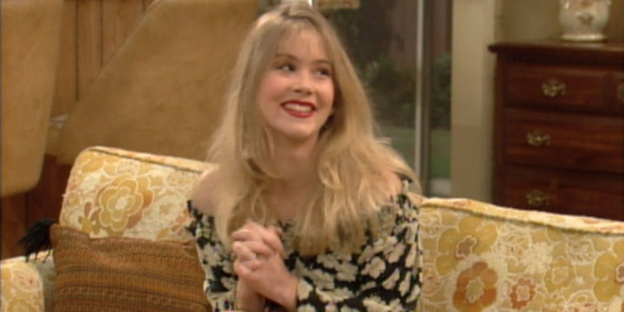 Christina Applegate as Kelly Bundy smiling in Married with Children