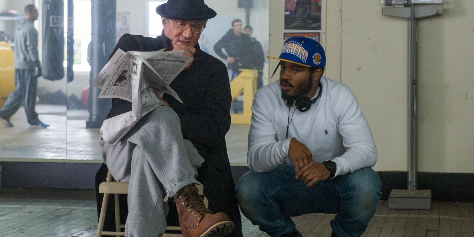 Sylvester Stallone and Ryan Coogler filming a scene for Creed