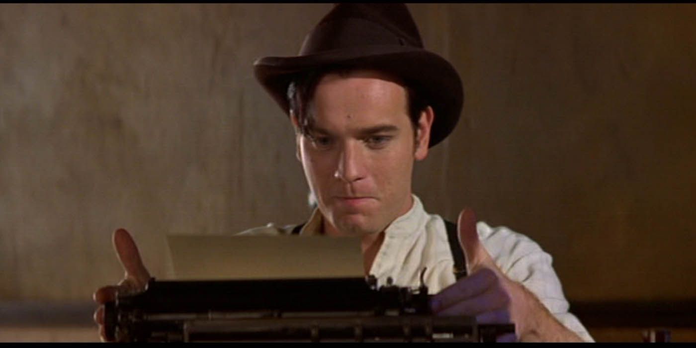 Ewan McGregor sitting at a typewriter Moulin Rouge