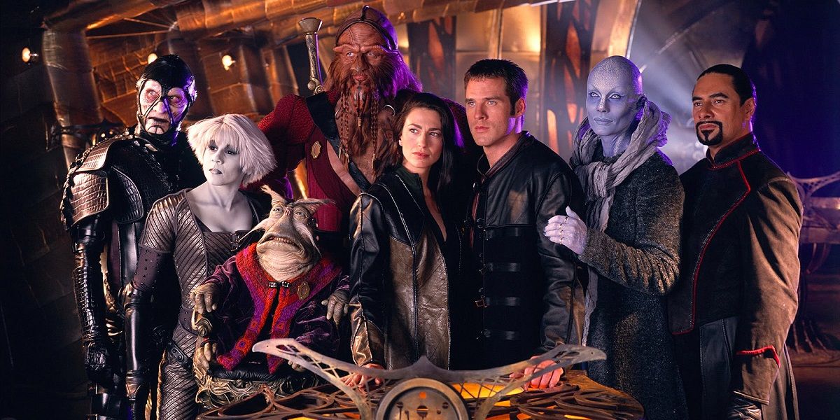 The crew of the ship look on from Farscape