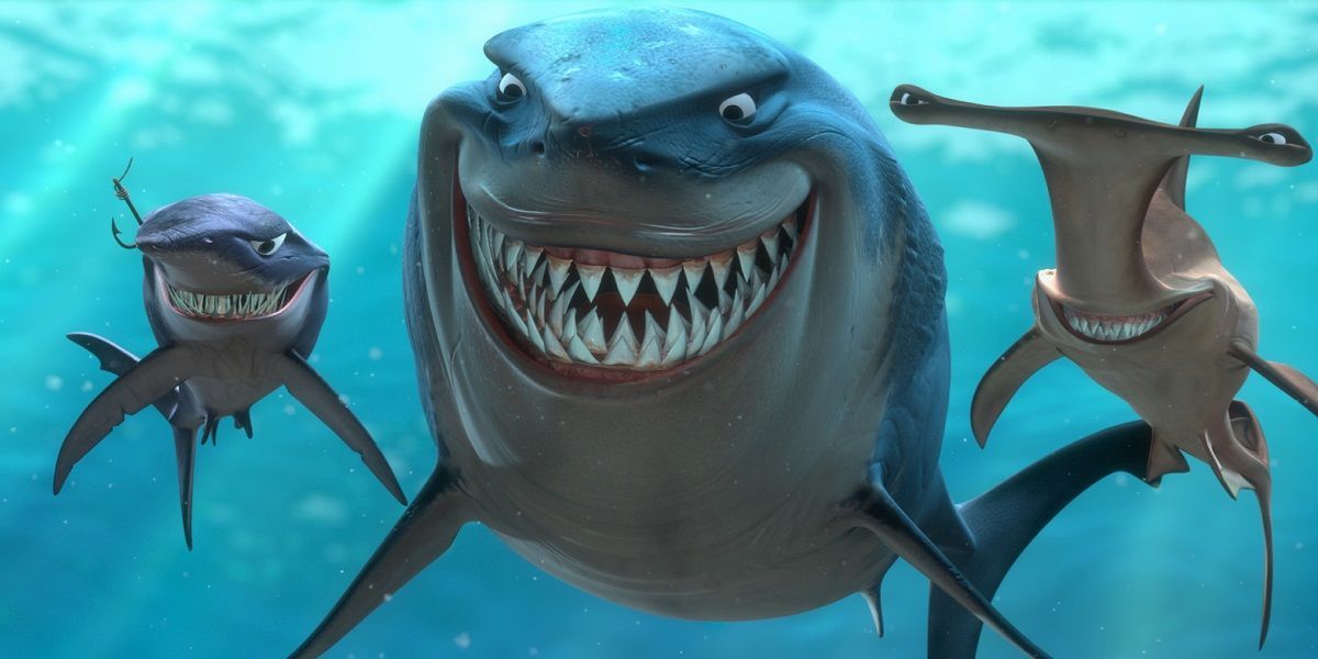 Bruce e os tubarões sorrindo em Procurando Nemo