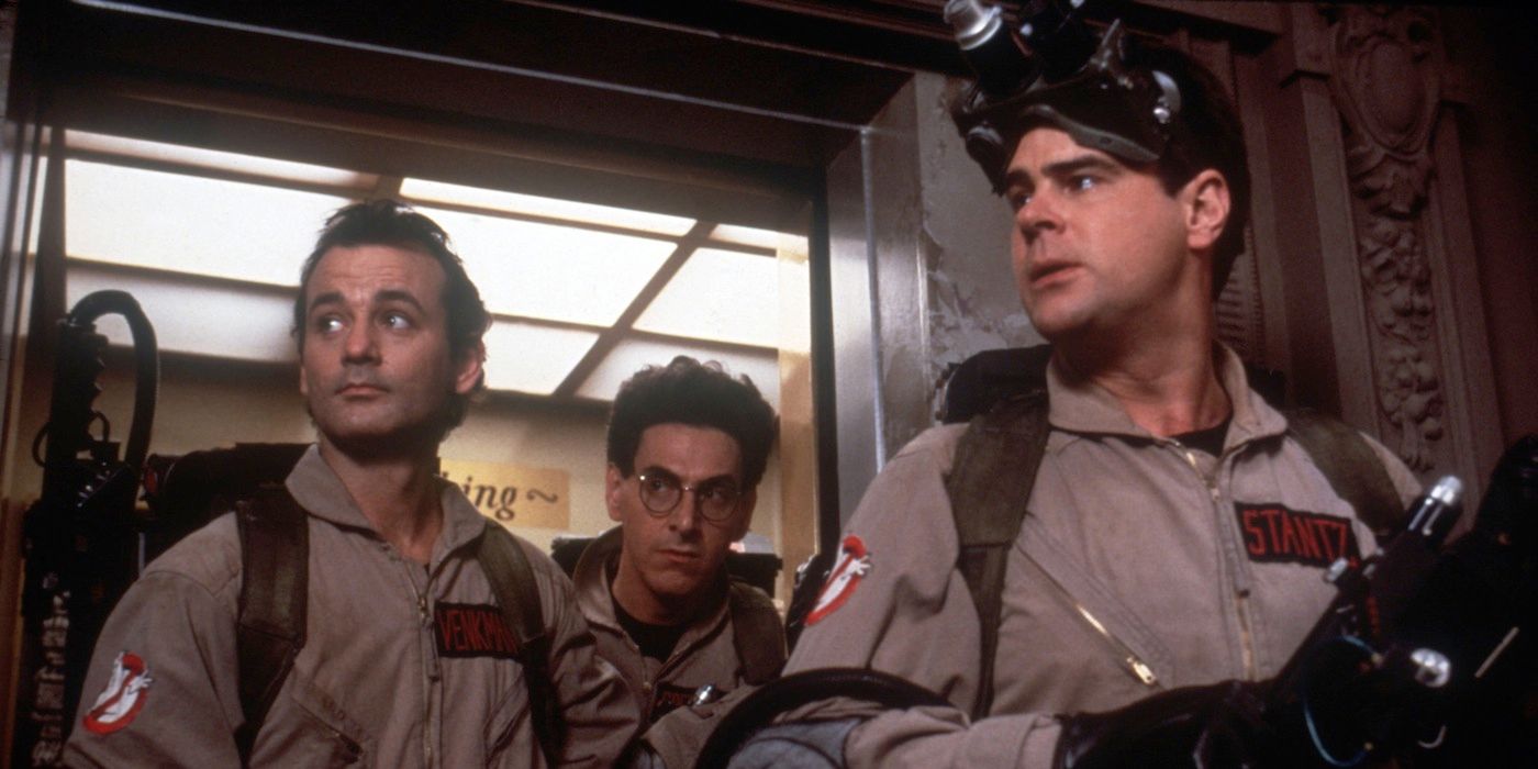 Bill Murray, Harold Ramis, and Dan Aykroyd getting off an elevator in Ghostbusters (1984)