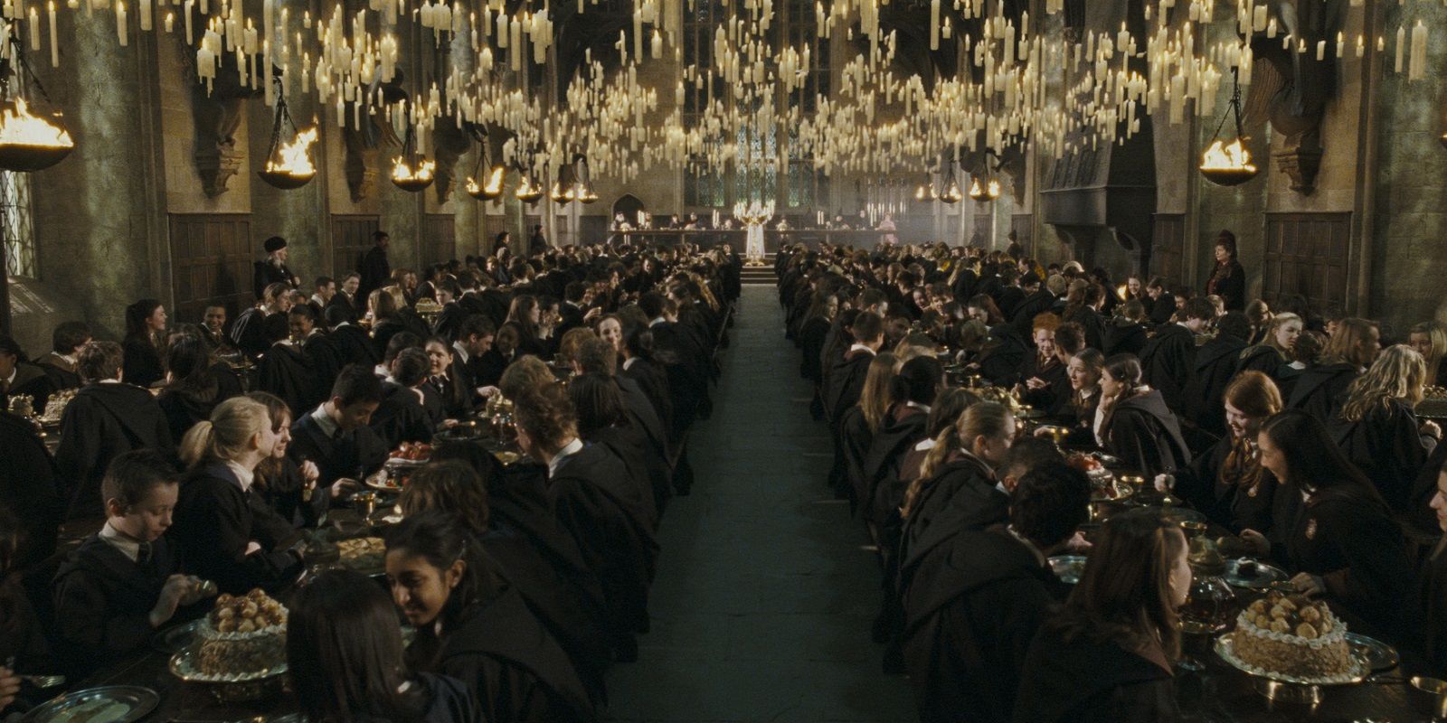 A shot of students gathered for a meal in Harry Potter&rsquo;s Great Hall.