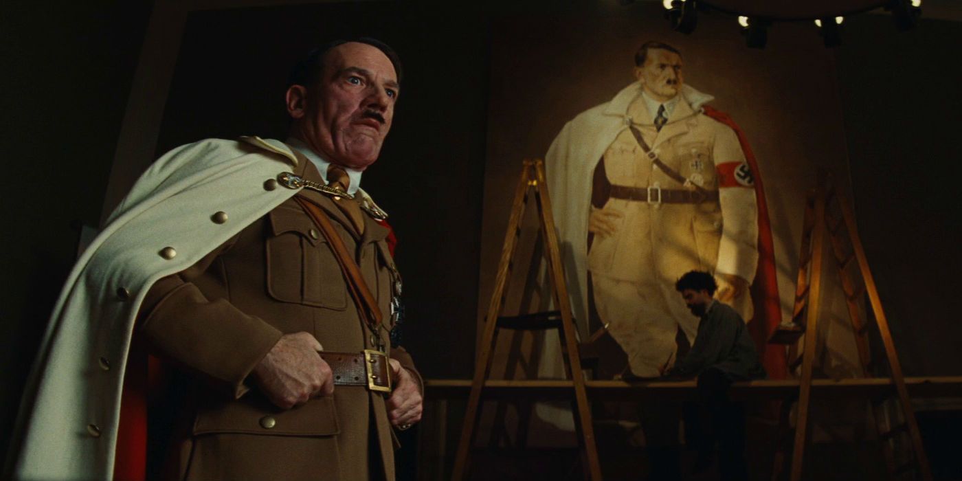 Hitler standing in front of a portrait of himself in Inglourious Basterds
