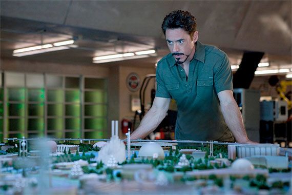 Robert Downey Jr with a model of Stark Expo