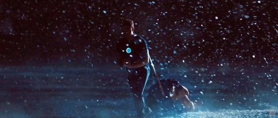 Tony Stark pulling Iron Man armor through the snow