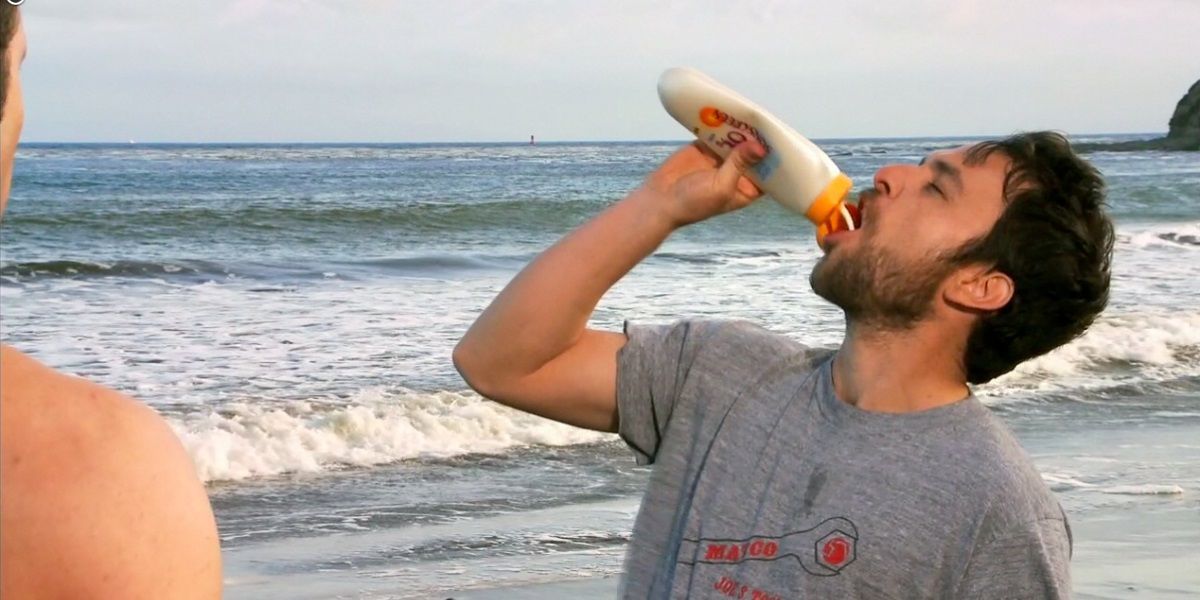 Charlie drinks sunblock on the beach in It's Always Sunny in Philadelphia.