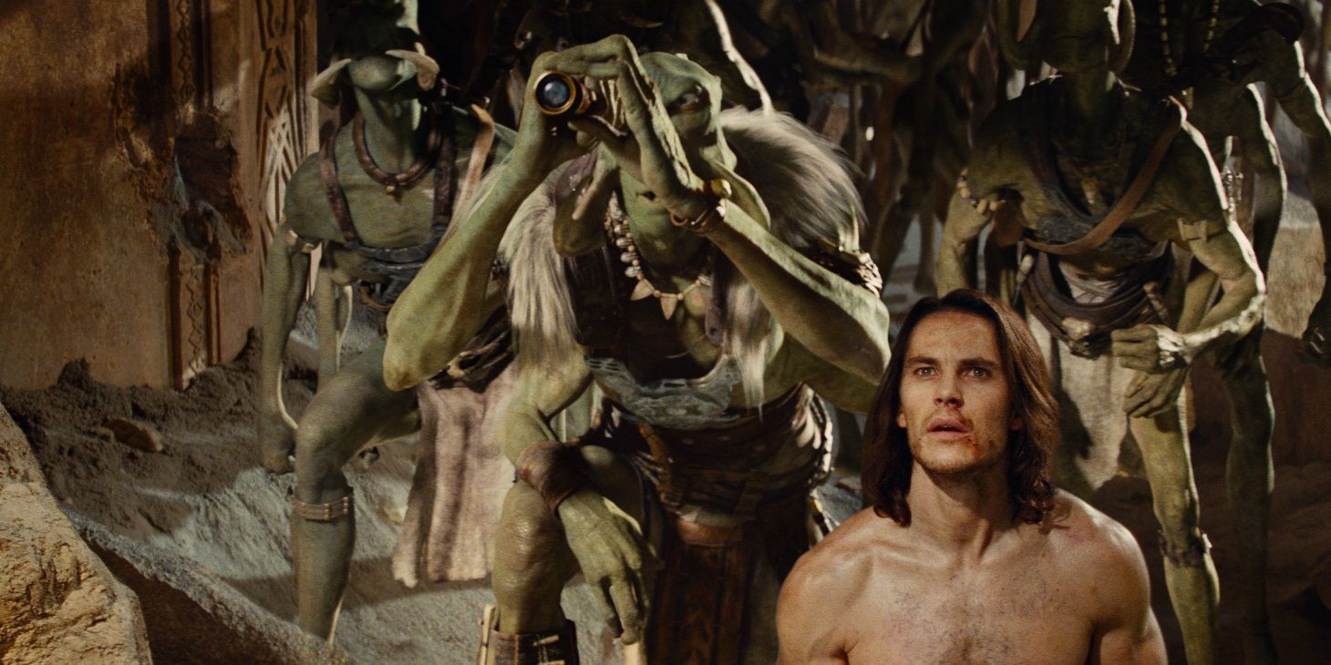 Taylor Kitsch in John Carter from Mars with Barsoomians