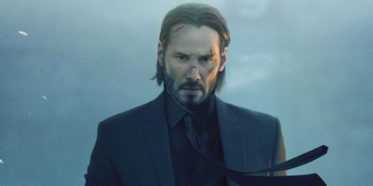 An image of John Wick looking omnious in the movies