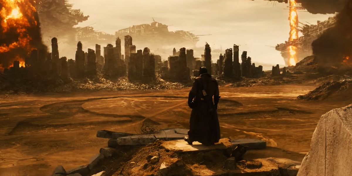 Batman looking at a dystopian environment 