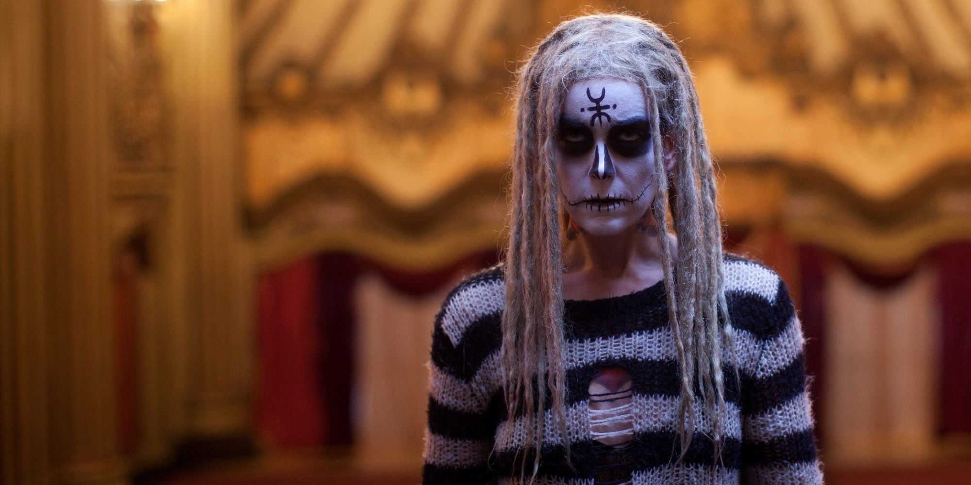 Heidi with white make-up on her face in The Lords of Salem