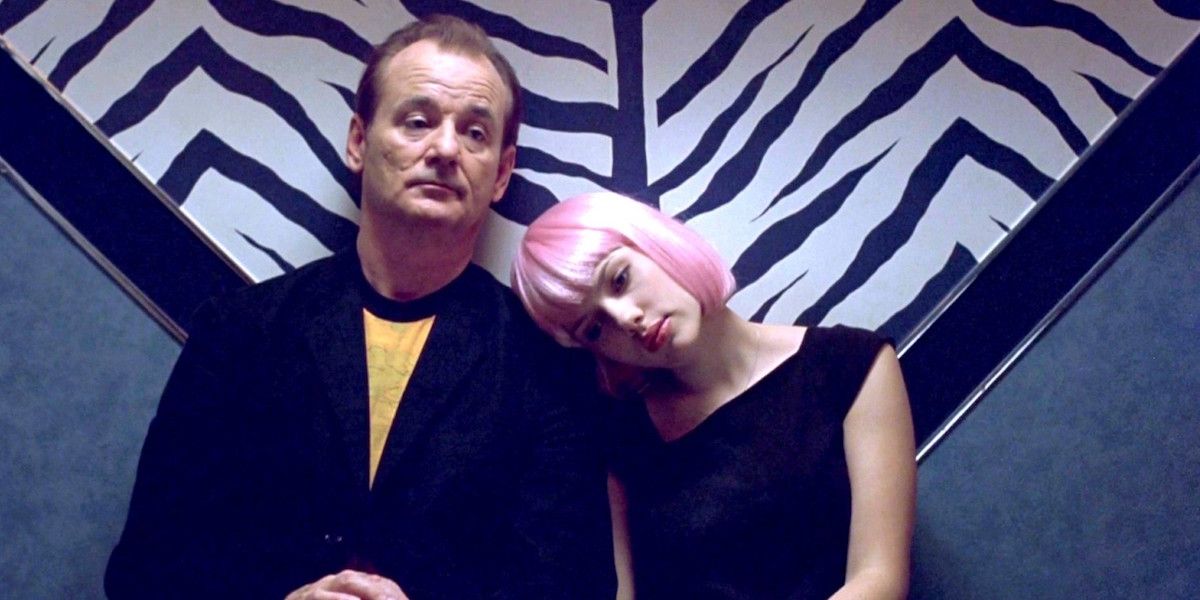 Scarlet Johansson lays her head on the shoulder of Bill Murray from Lost in Translation