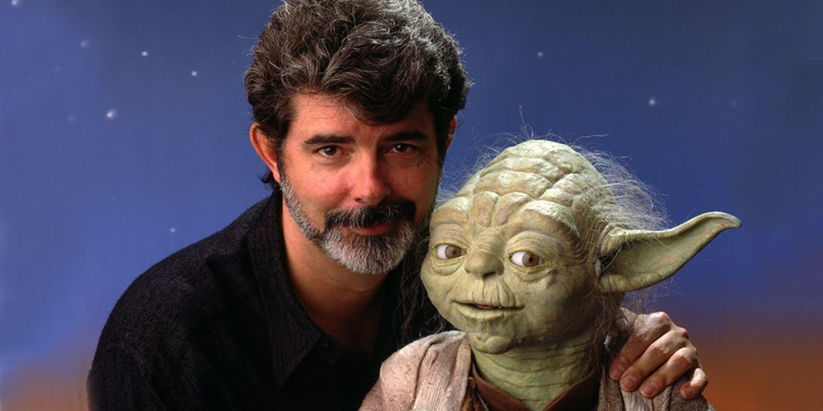 George Lucas Poses with Yoda - 12 Facts You Didnt Know About Yoda