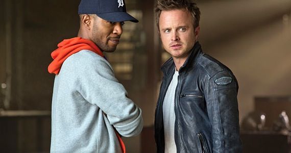 Kid Cudi and Aaron Paul in Need for Speed