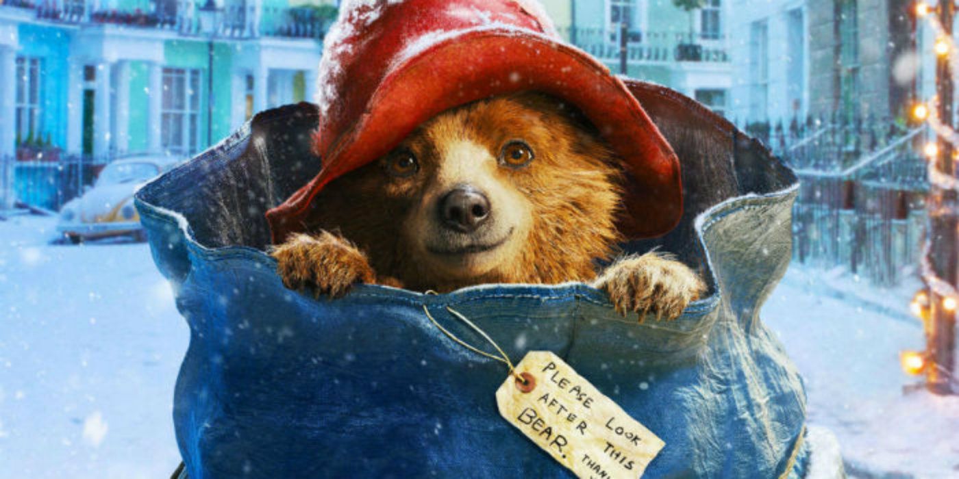 Paddington in a mail bag with a London street in the background