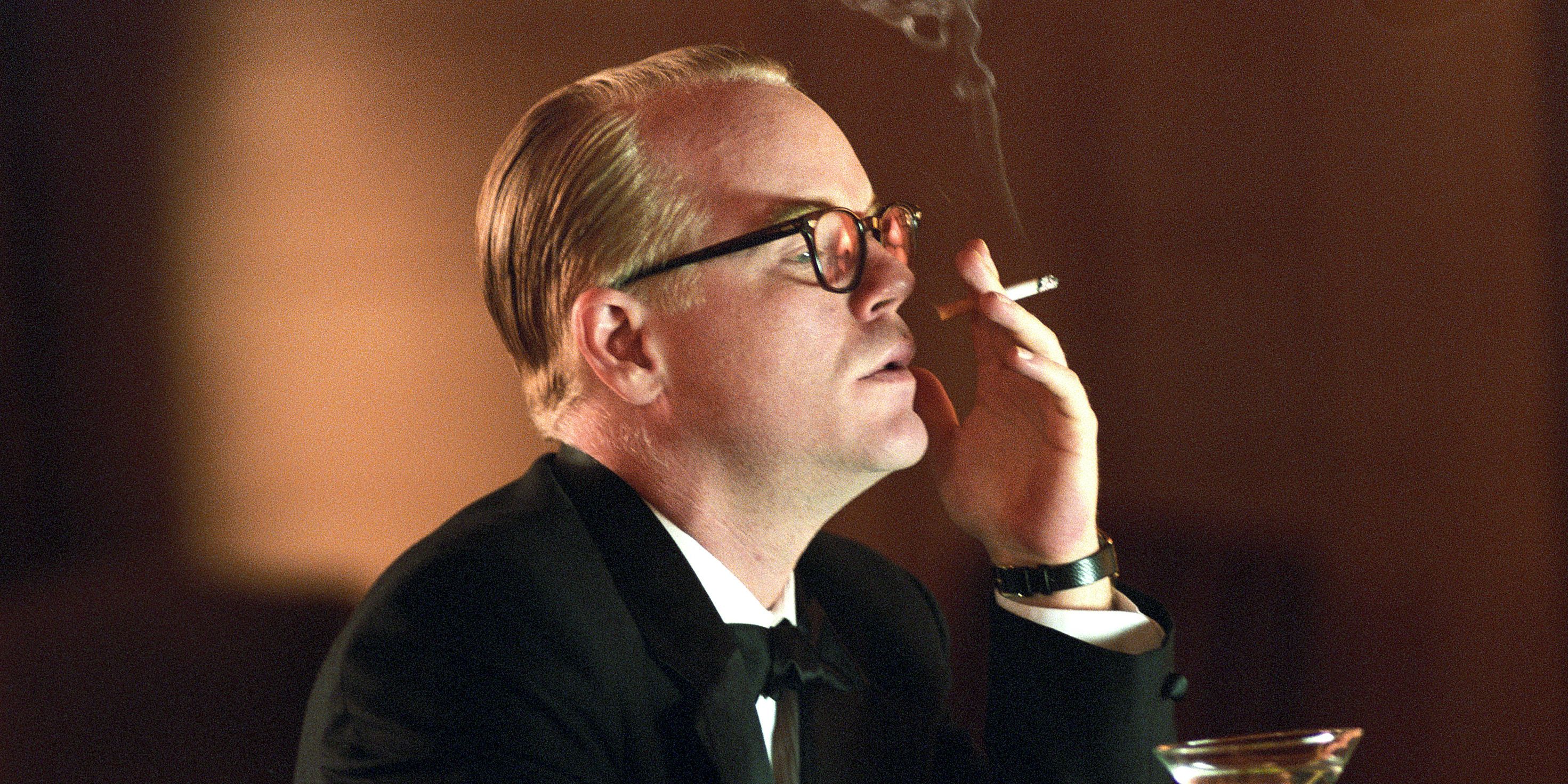 Philip Seymour Hoffman smoking a cigarette in Capote