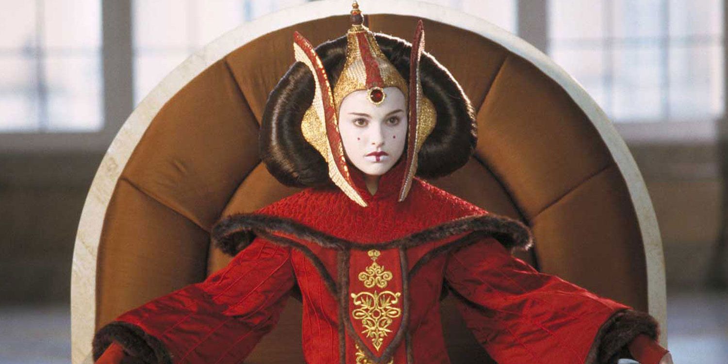 Queen Amidala sits on her throne looking serious in The Phantom Menace