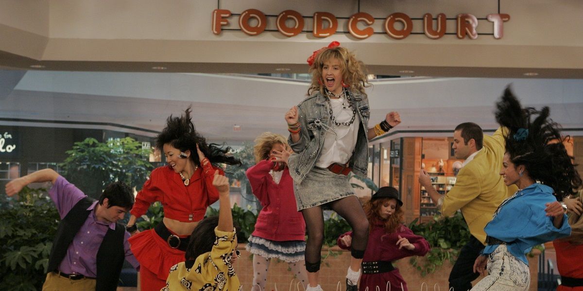 Robin Sparkles sings and dances at the mall in How I Met Your Mother