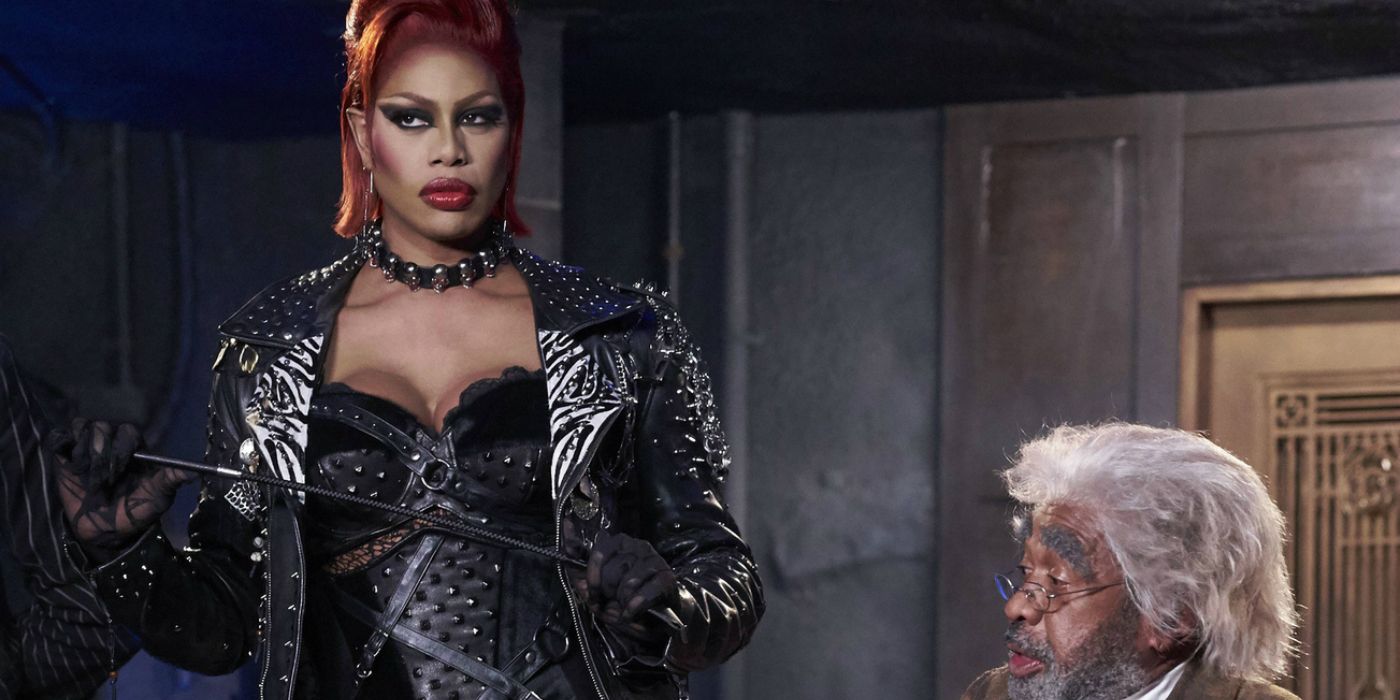 Laverne Cox in a black corset and black jacket with a whip in hand and Ben Vereen at the Rocky Horror Picture Show: Let's Do The Time Warp