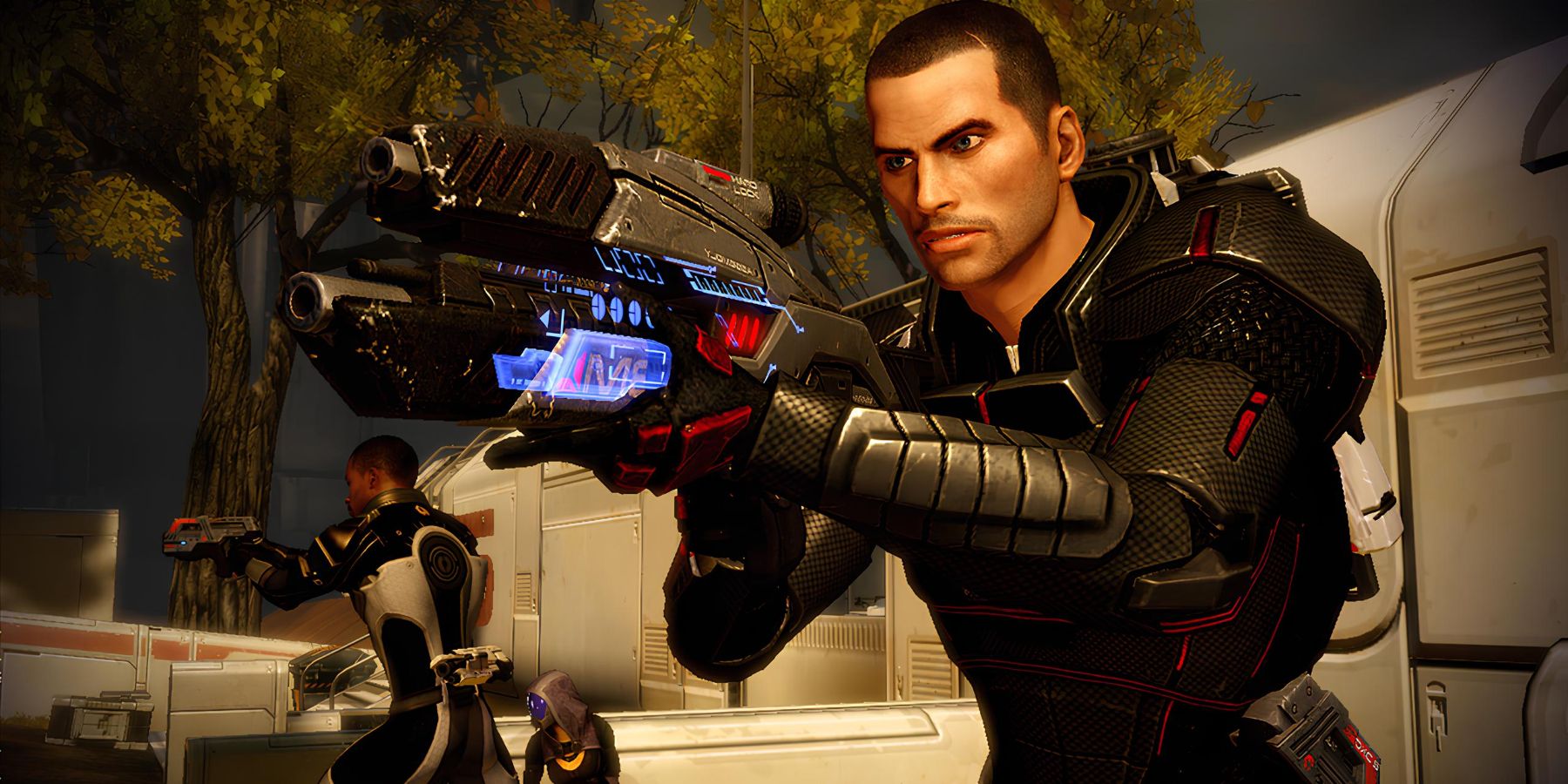 shepard-with-a-gun-in-mass-effect-2.jpg