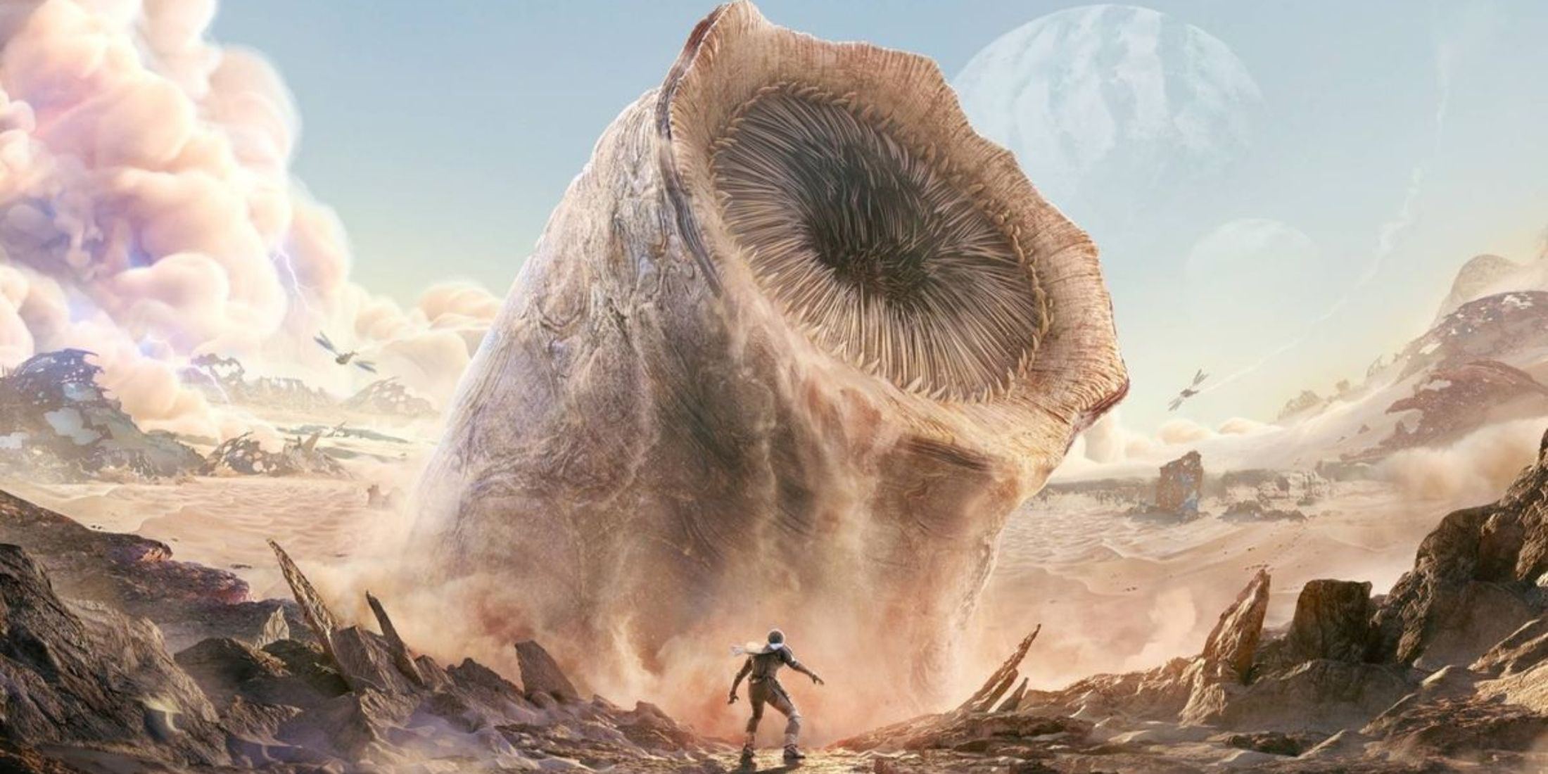 A sand worm coming out of the ground while a person watches it nearby from the Dune Awakening key art.