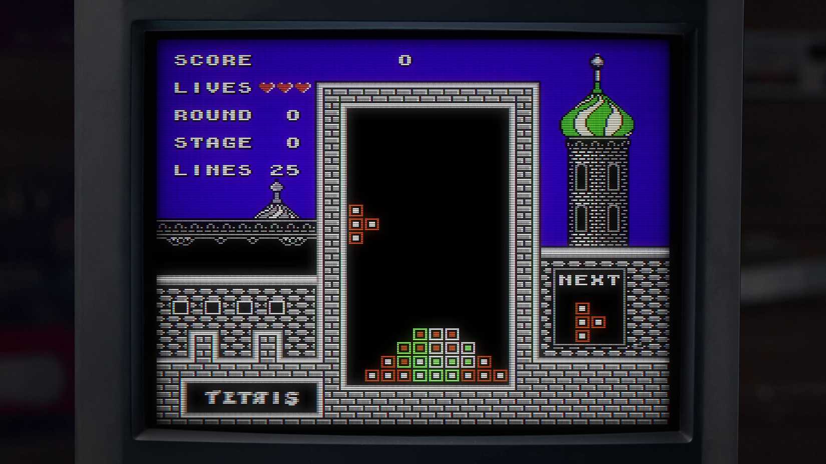Tetris Forever level showing the game inside a castle framing.