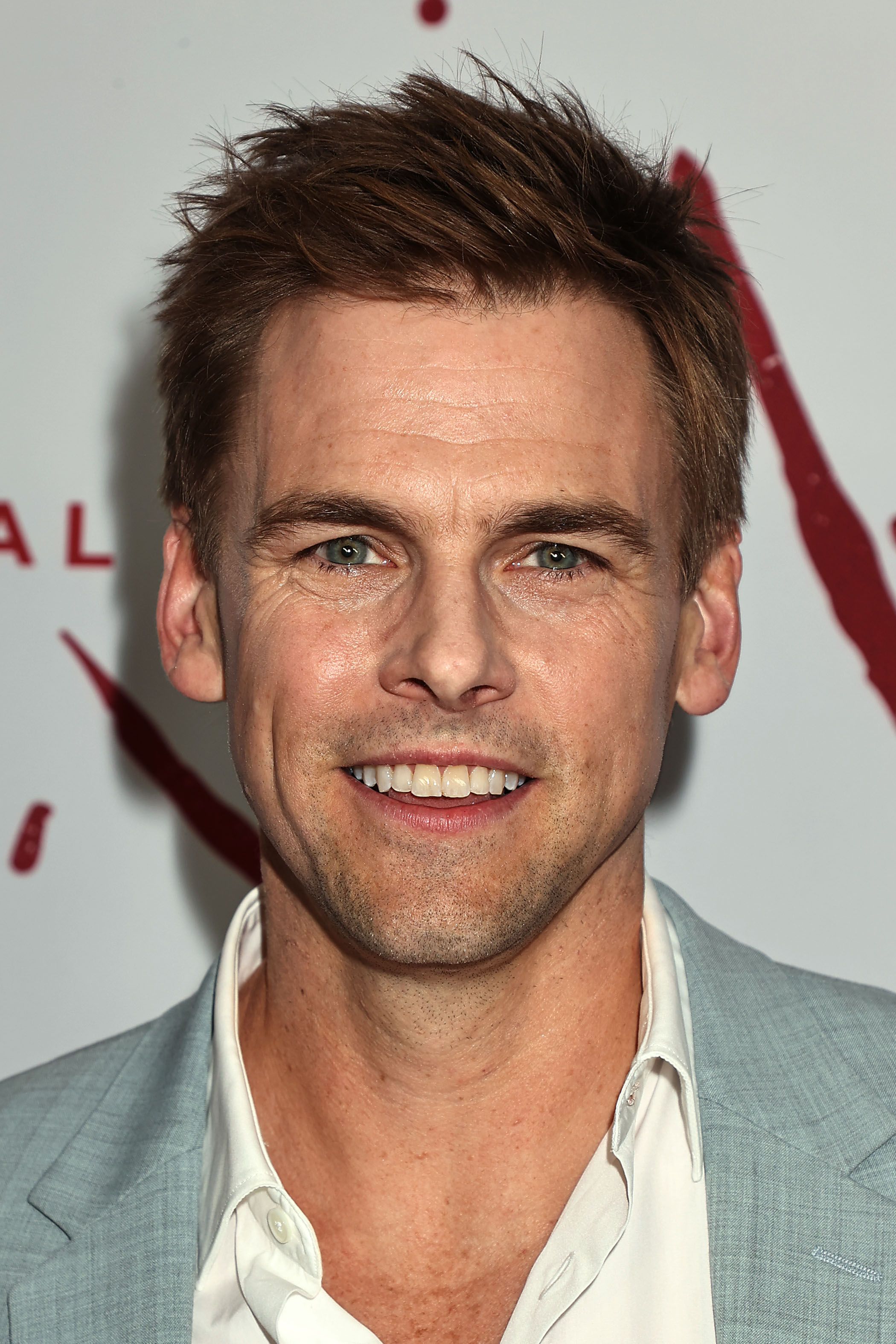 Headshot Of Tommy Dewey