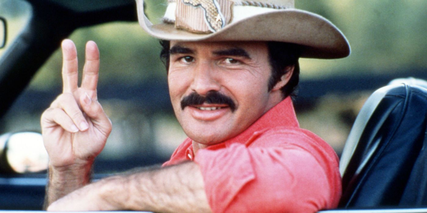 Bandit does the peace sign while riding a car in Smokey and the Bandit
