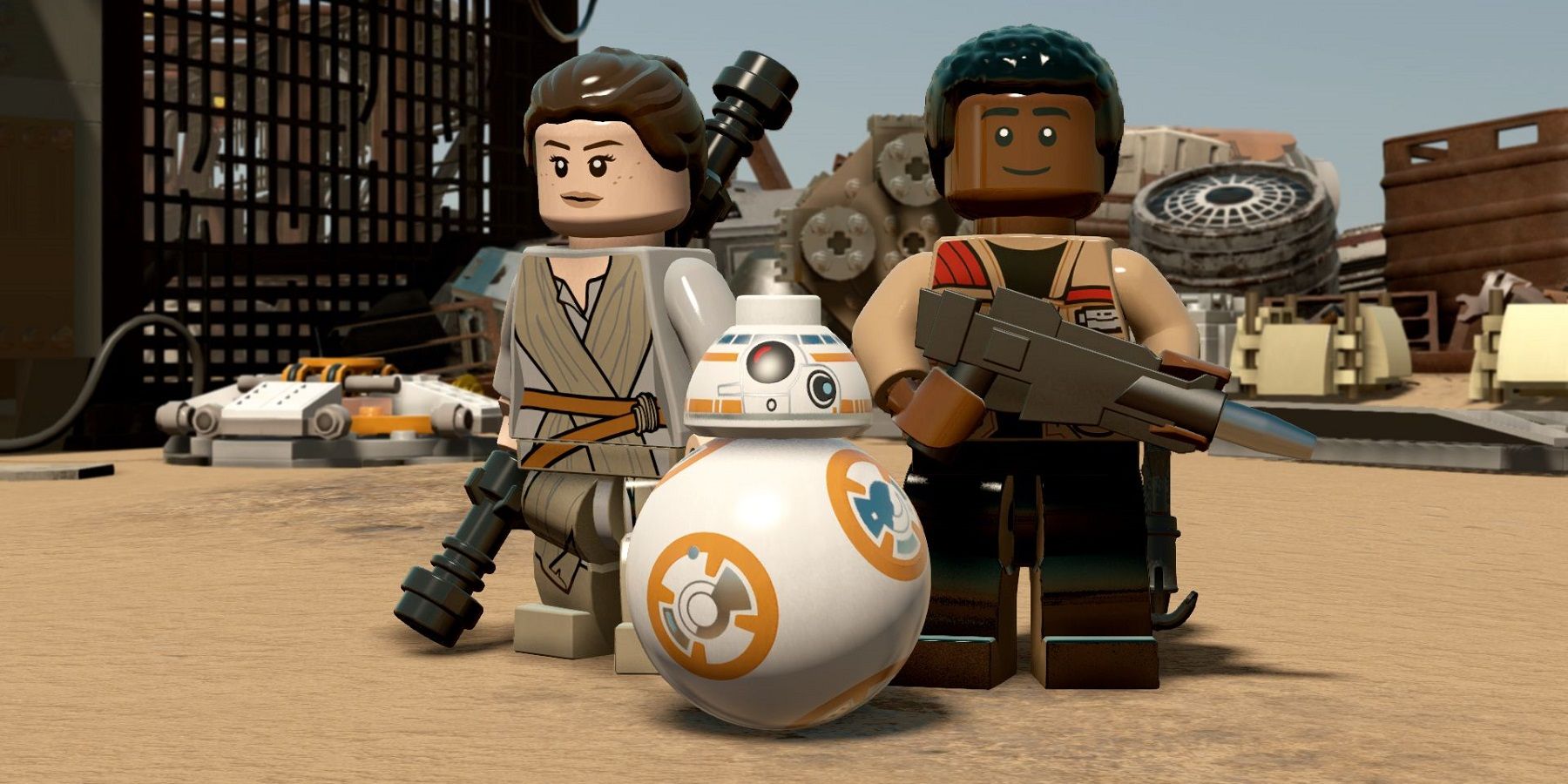 Lego Star Wars Force Awakens. Finn, Rey and BB-8 standing in the Jakku desert
