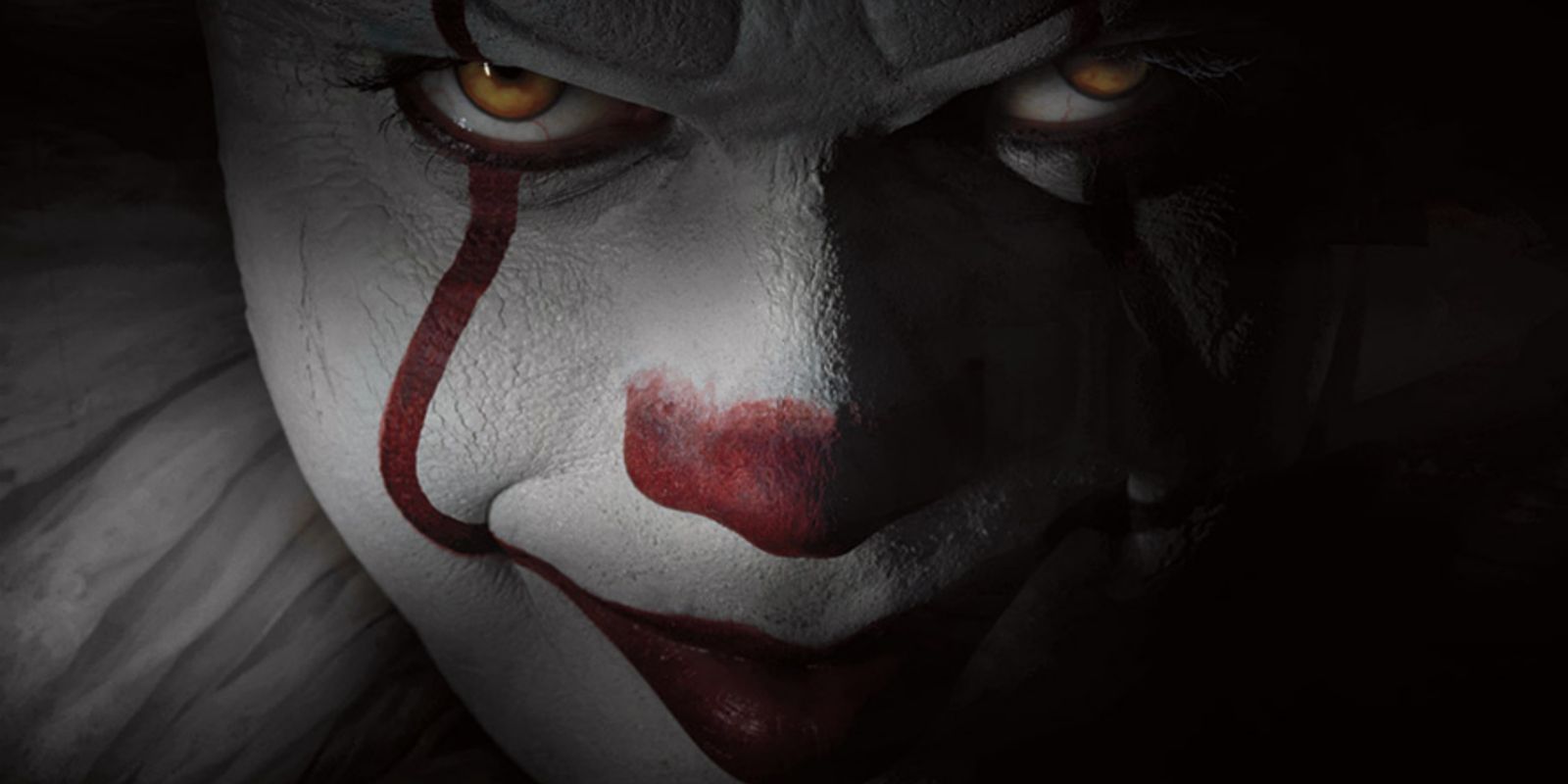 Pennywise waits in the darkness in It