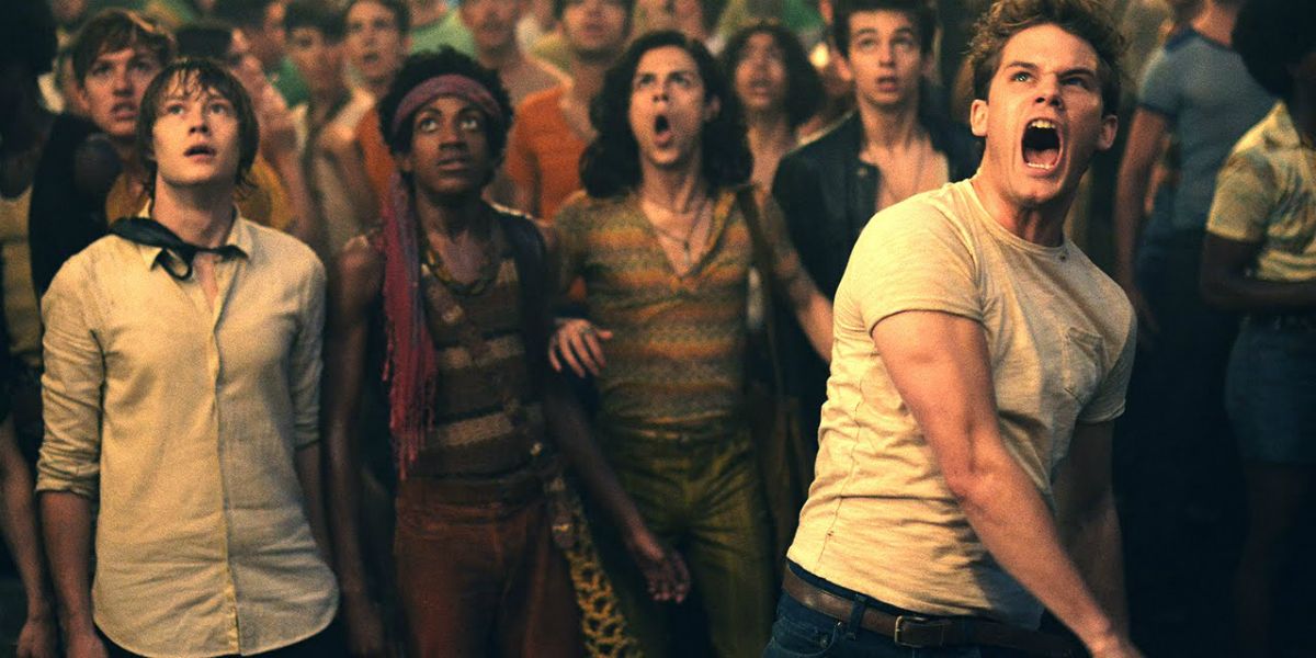 Jeremy Irvine and costars protesting in Roland Emmerich&rsquo;s Stonewall