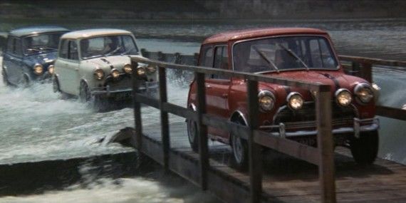 Three Mini Coopers drive through a lake in The Italian Job