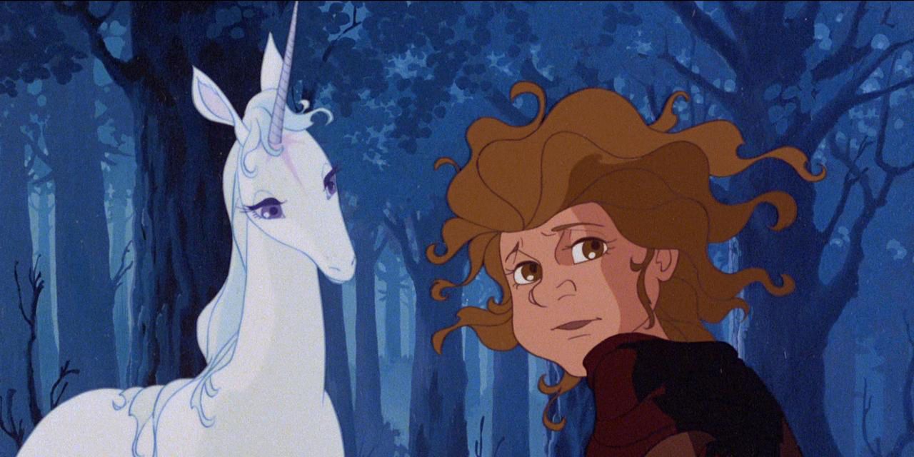 A boy and unicorn in The Last Unicorn