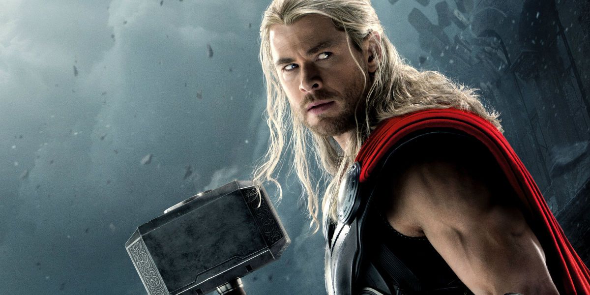 Thor holding Mjolnir and looking back with a suspicious look on his face.