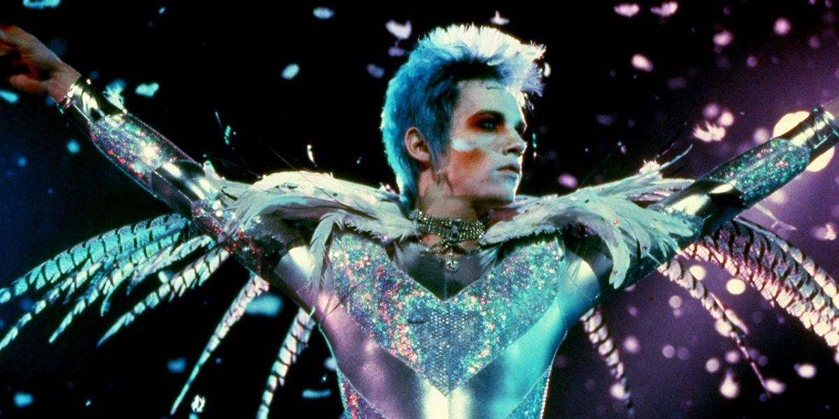 A character in an elaborate costume in Velvet Goldmine