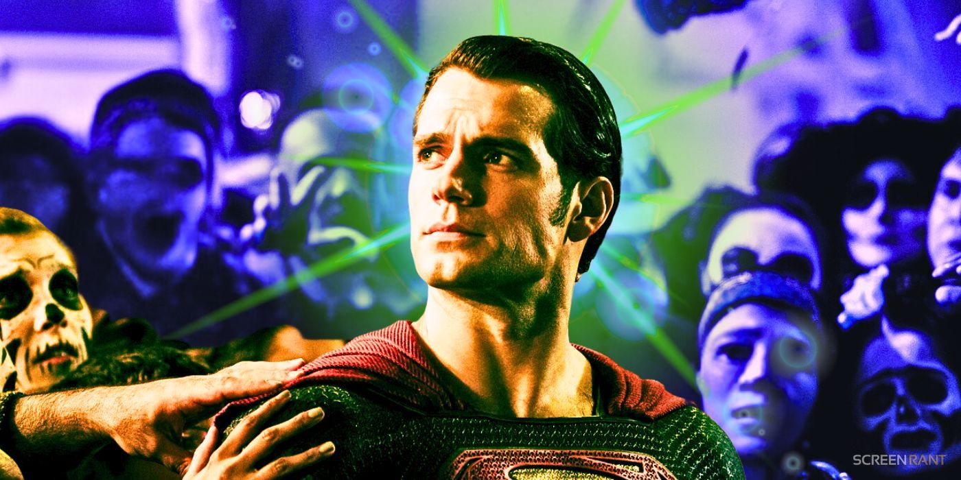 Batman v Superman Dawn of Justice shot of Henry Cavill's Superman in the middle of a crowd touching him with an added green light coming from behind him.