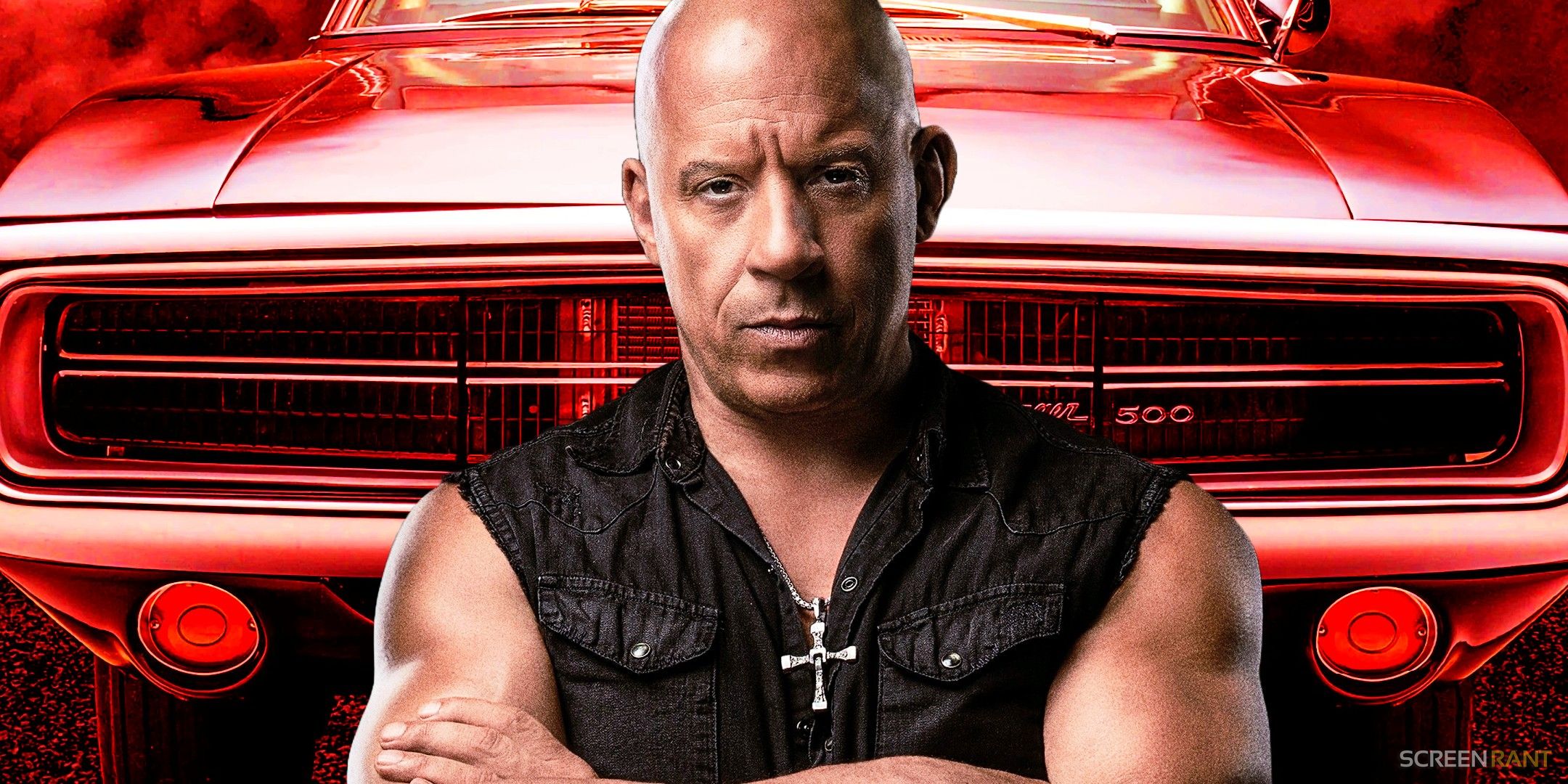 Vin Diesel as Dominic Toretto standing in front of a car in Fast & Furious